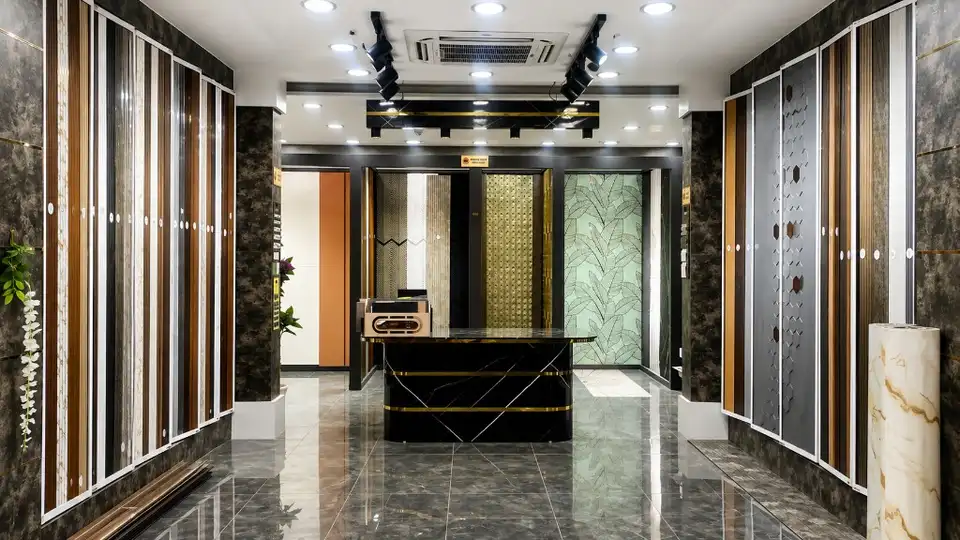 Laminate showroom with pull-out racks, marble reception counter and feature wall panels