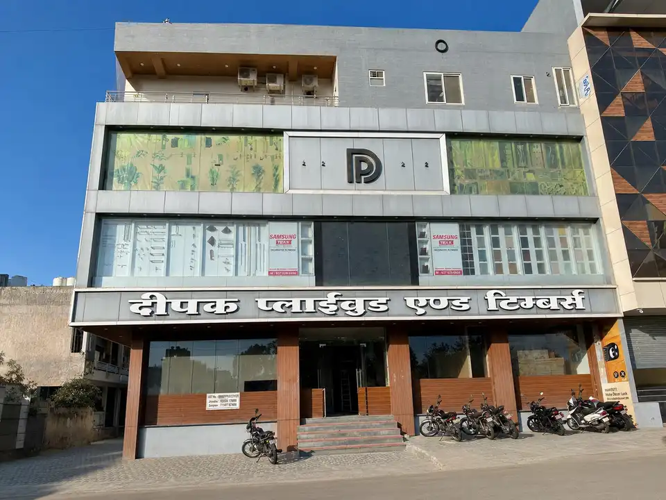 Deepak Plywood and Timbers showroom building with its signboard and glass frontage